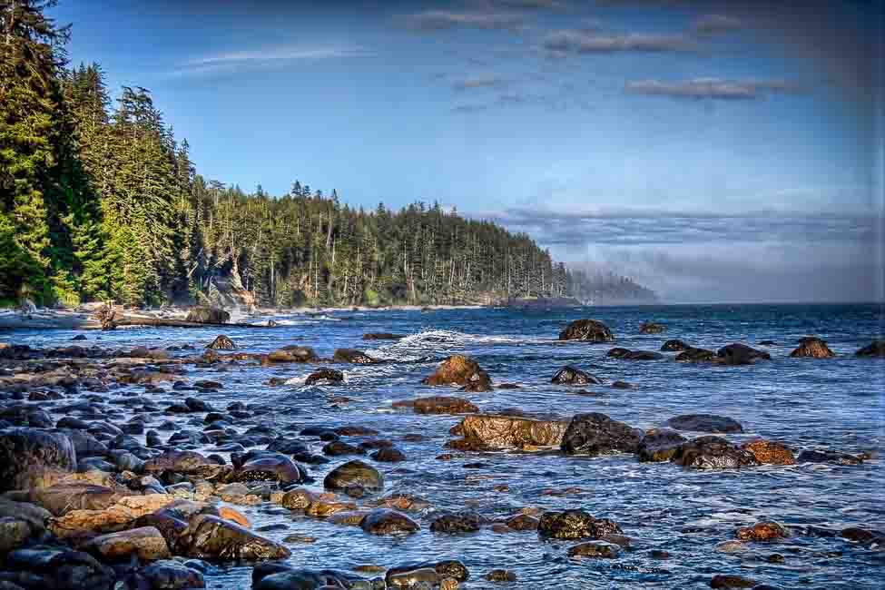Waves washing over a rocky Pacific shoreline